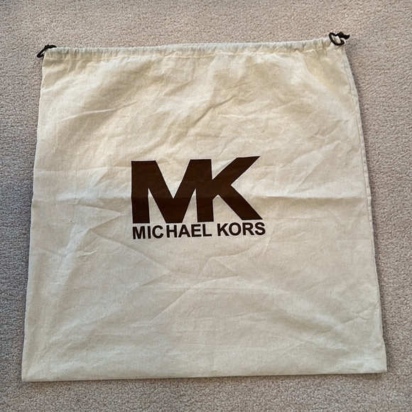 Michael Kors tan leather purse. Gold emblem. Gently used
Snap closure dust bag - Picture 9 of 9